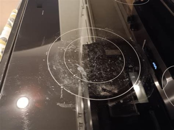 Can I use Windex on fireplace glass?