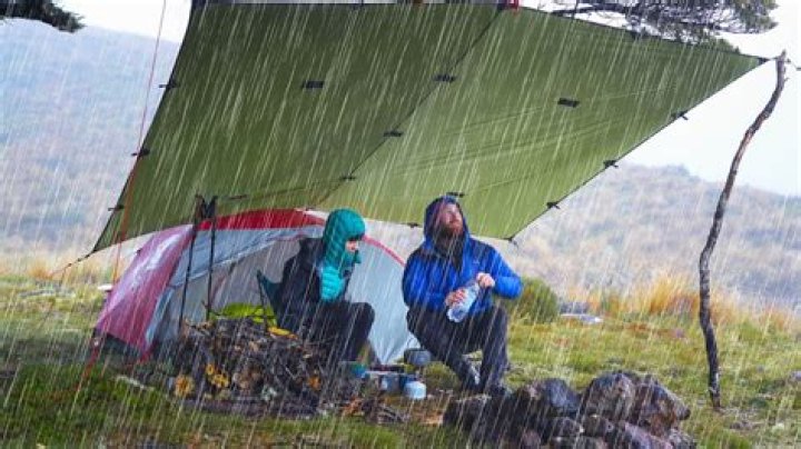 How do I protect my camping tent in the rain?