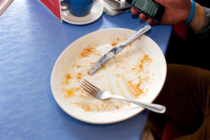 Is it rude to push your plate away?