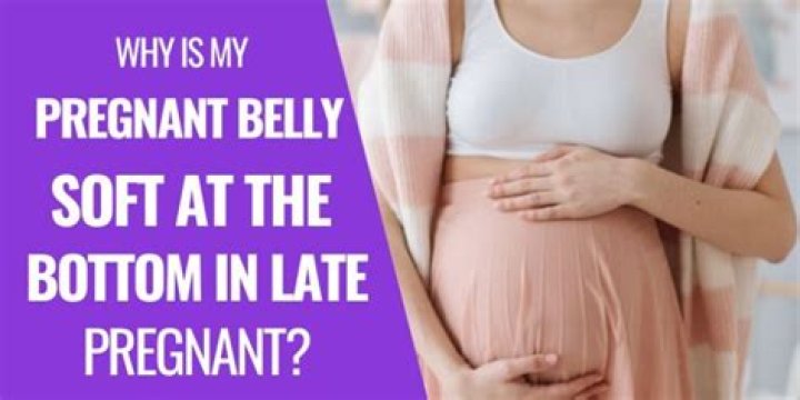 Why is my stomach hard at the top and soft at the bottom pregnant?